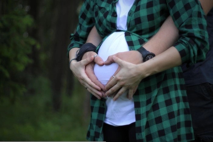 Hands on preganant belly